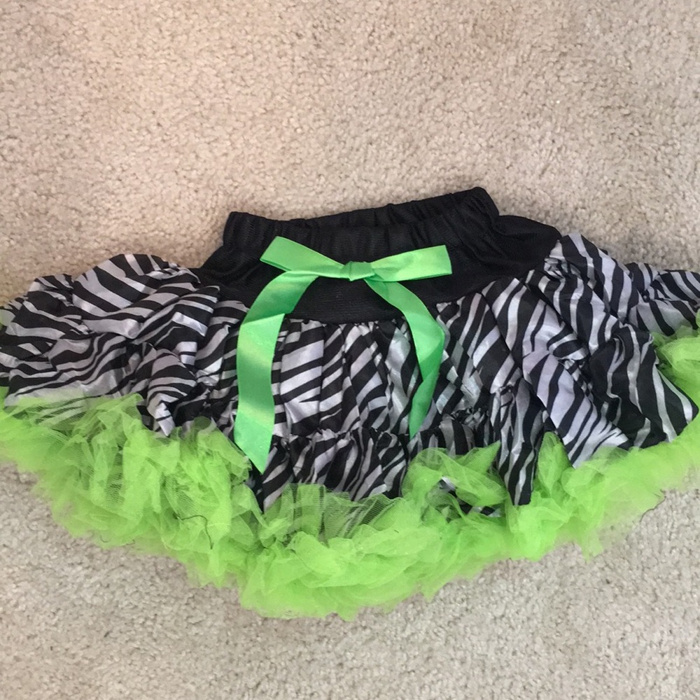 A green zebra print tutu
